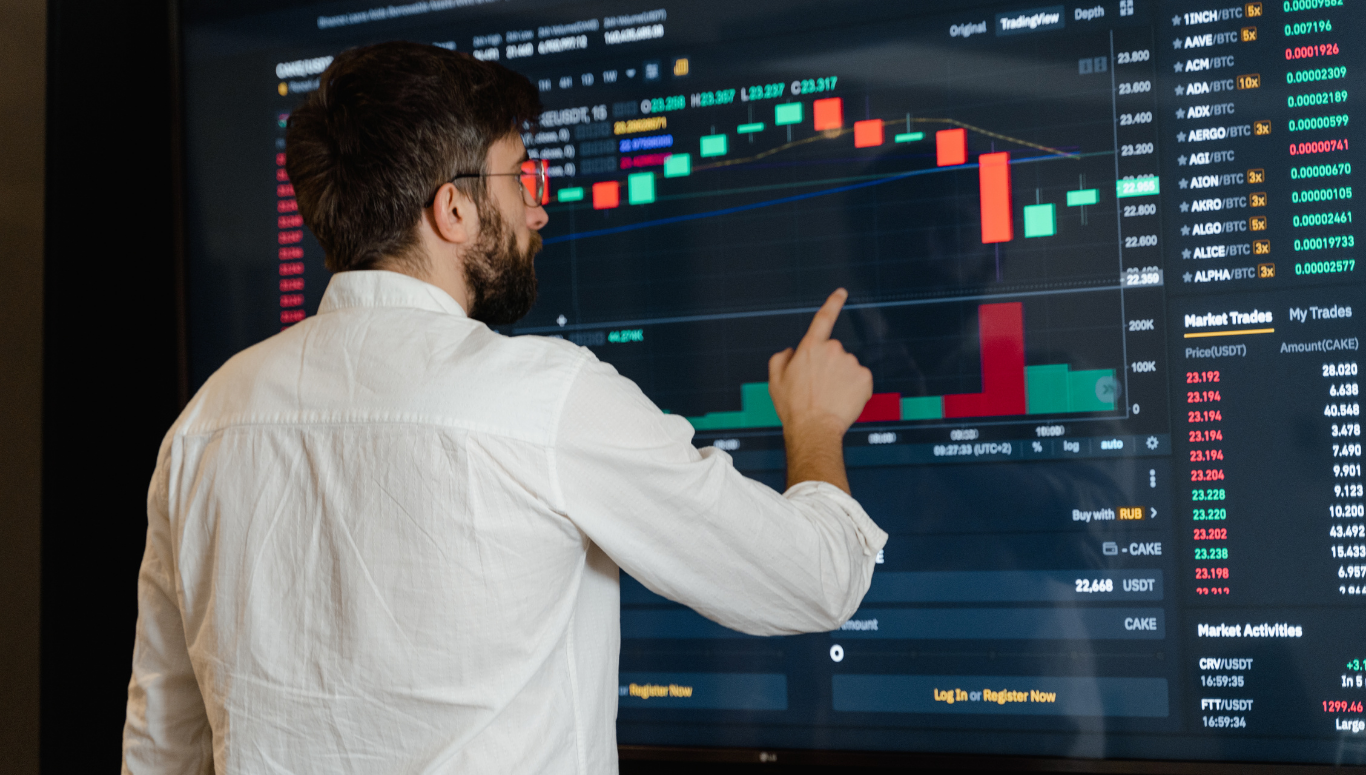 a group of people looking into monitor